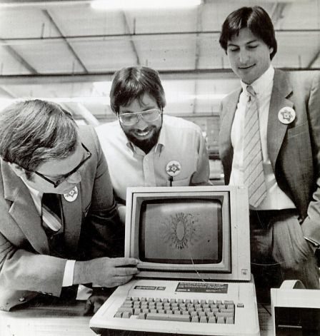 Steve Jobs and Steve Wozniak presenting an early Apple computer